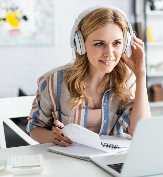 selective-focus-of-attractive-woman-in-headphones-2024-11-19-16-57-51-utc