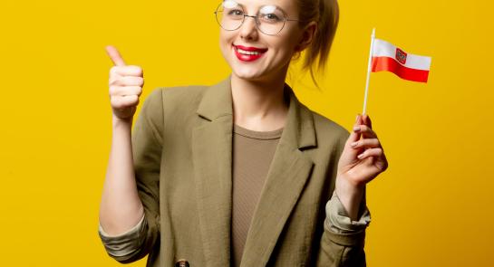 style-blonde-woman-in-jacket-with-polish-flag-on-y-2023-11-27-05-31-59-utc-scaled