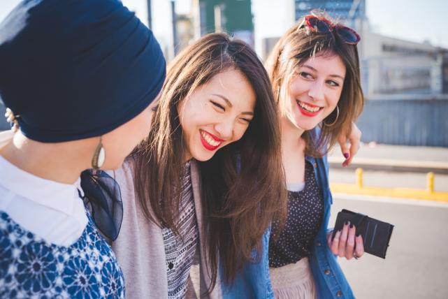 group-of-young-women-enjoying-free-time-and-smilin-2022-01-18-23-30-08-utc-scaled