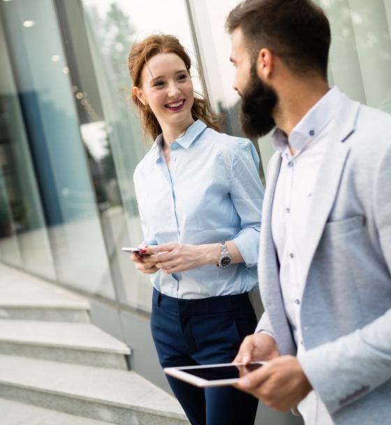 business-colleagues-on-city-streets-smiling-worki-2021-08-26-17-34-04-utc